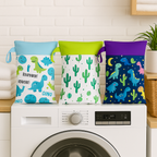 Tre wet bag airenso con stampa dinosauri, cactus e spazio